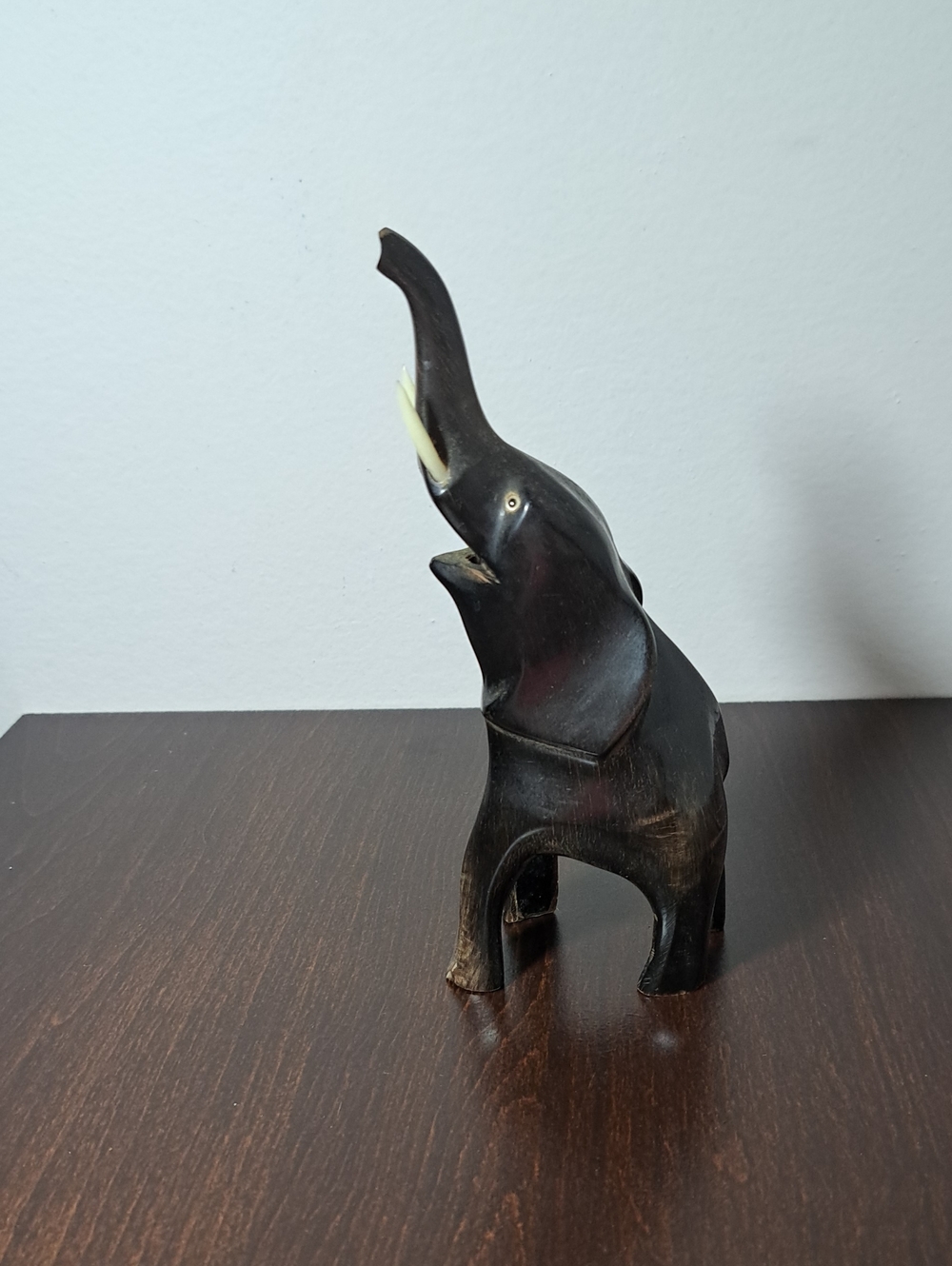 Hand-Carved Black Wood Elephant Sculpture with Raised Trunk